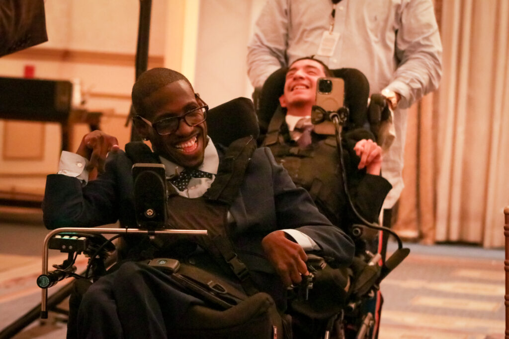 Shareef and Mark smile as they greet the crowd