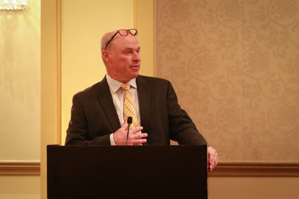 Honoree Karl Dickman looks out at the crowd as he gives his speech